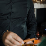 Men's Work Shirt slim-fit black sweat-proof work shirt with 4-way stretch and antimicrobial fabric technology.