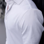 Close-up of a man wearing a white Never-Iron Work Shirt showcasing smooth fabric and comfortable fit.
