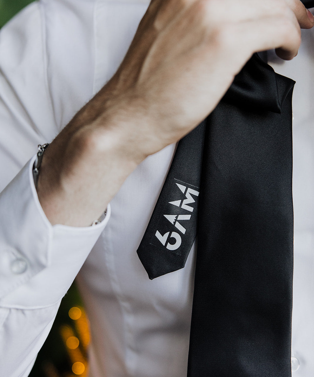 6AM Formal Black Tie in black satin with 6AM logo on tail, perfect for pairing with 6AM WorkShirt.