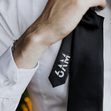 6AM Formal Black Tie in black satin with 6AM logo on tail, perfect for pairing with 6AM WorkShirt.
