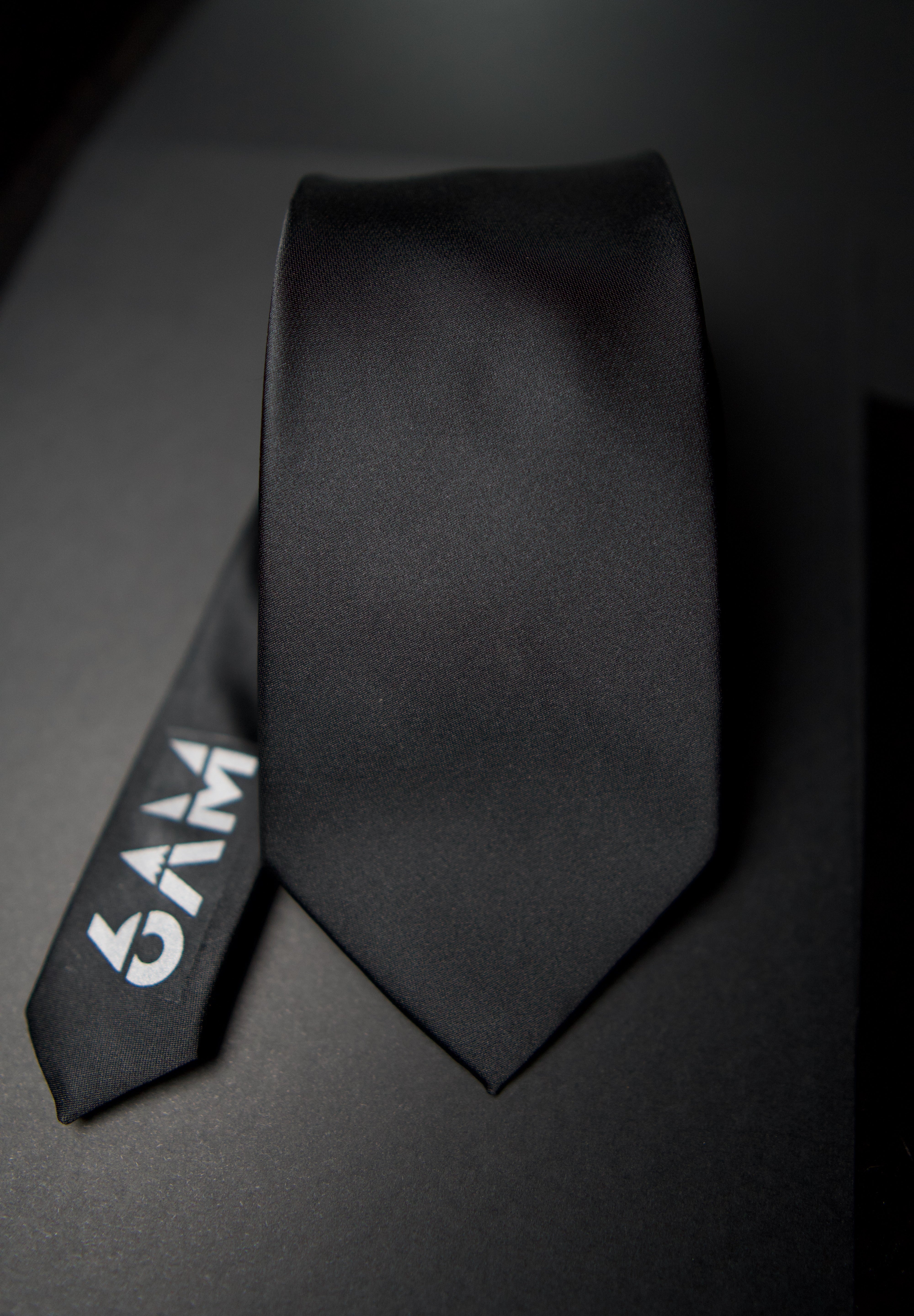 6AM Formal Black Tie in sleek black with 6AM logo on the tail, perfect for pairing with the 6AM WorkShirt.