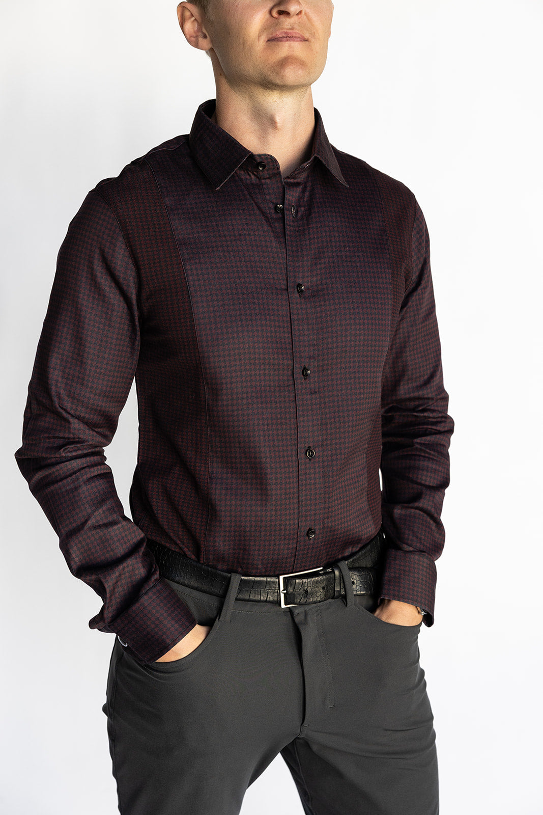 Man wearing the Bordeaux Arrowhead WorkShirt in a deep burgundy and black geometric pattern, front view.