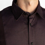 Close-up of the men's Bordeaux Arrowhead WorkShirt collar and burgundy and black geometric micro-pattern.