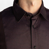 Close-up of the men's Bordeaux Arrowhead WorkShirt collar and burgundy and black geometric micro-pattern.