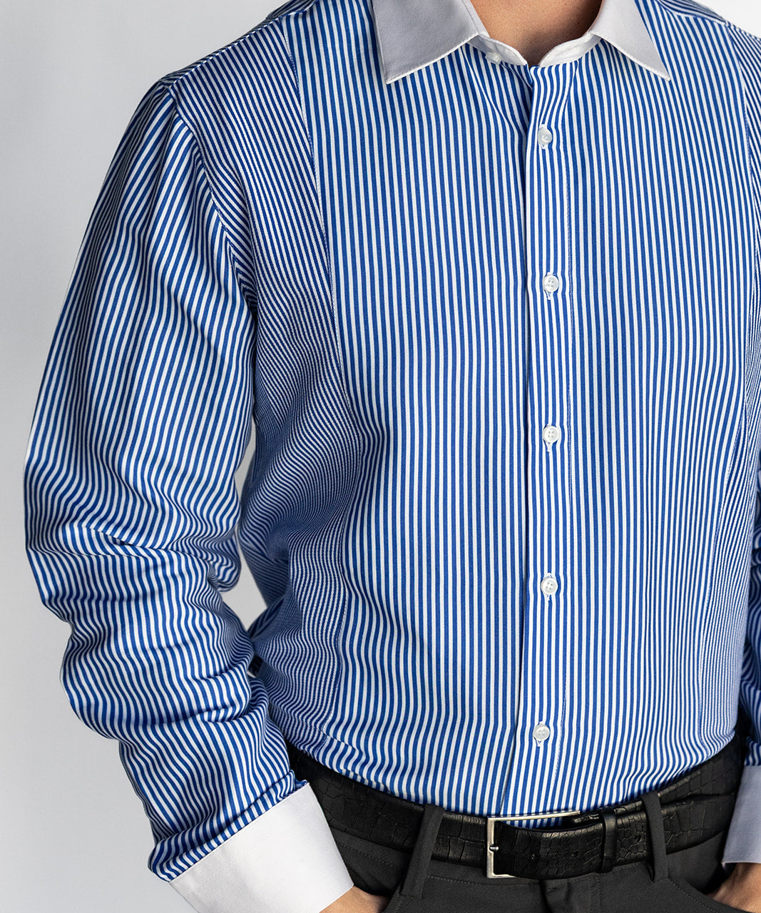Blue and white striped shirt with a gray collar on a plain background