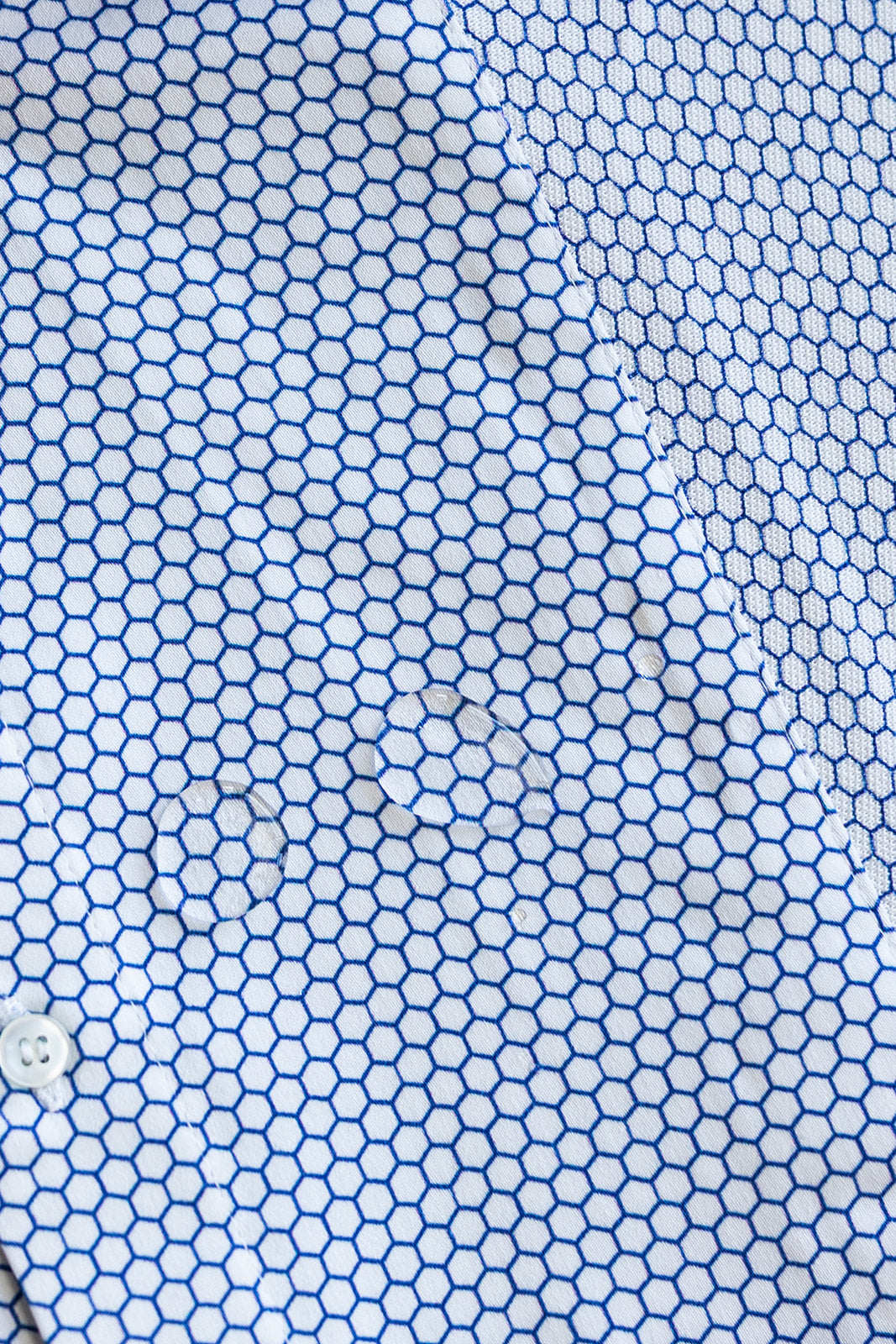 HEX Nº 6 WorkShirt in Glacier, close-up showing water beading on performance fabric