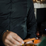 Men's Work Shirt slim-fit black sweat-proof work shirt with 4-way stretch and antimicrobial fabric technology.