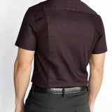 Back view of the men's short-sleeve Bordeaux Arrowhead WorkShirt showing the burgundy and black geometric pattern and tailored fit.