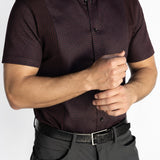 Men's short-sleeve Bordeaux Arrowhead WorkShirt in burgundy and black, shown from the front with dark trousers.