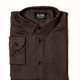 Folded Long Sleeve Women’s Bordeaux Arrowhead WorkShirt in a burgundy and black geometric pattern with collar and cuff visible.