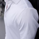 Close-up of a man wearing a white Never-Iron Work Shirt showcasing smooth fabric and comfortable fit.