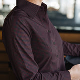 Side view of the Women’s Long Sleeve Bordeaux Arrowhead WorkShirt showing the burgundy and black geometric pattern and tailored fit.